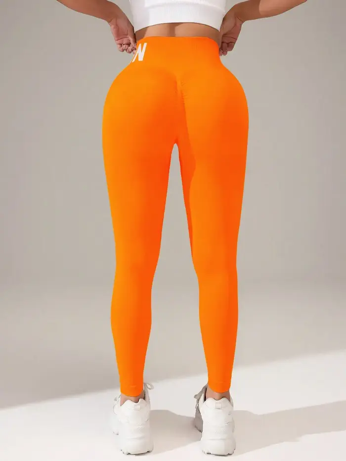 Leggings de yoga sans couture européens et américains avec lettrage de ceinture