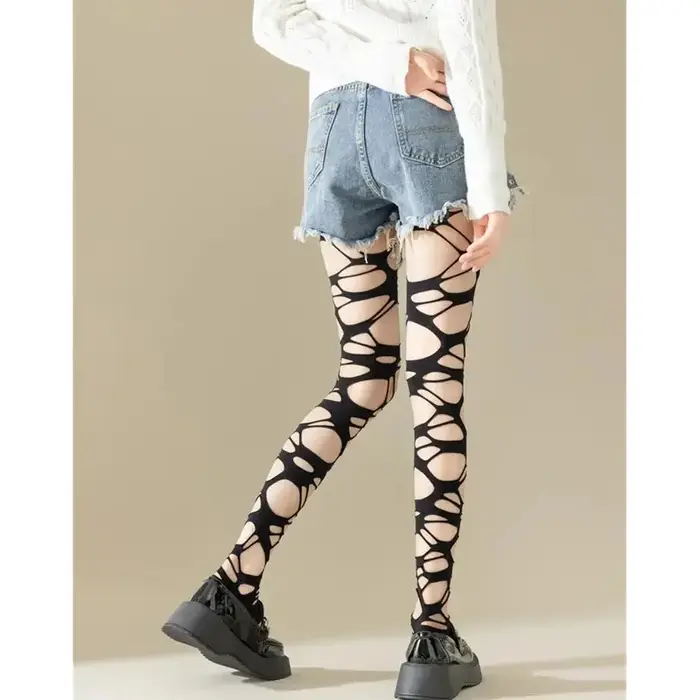 Collants résille noirs déchirés pour femme