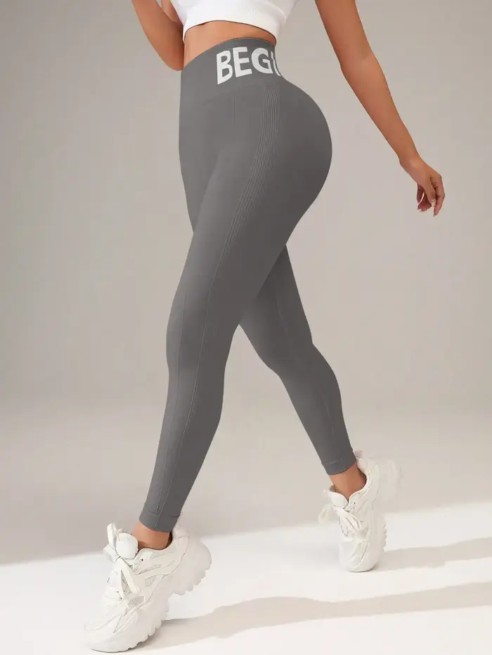 Leggings de yoga sans couture européens et américains avec lettrage de ceinture